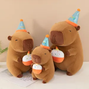 Cute capybara plush toy doll holding cake with party hat, soft stuffed animal gift for kids.