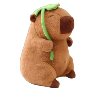 Cute brown capybara plush toy holding green leaf stuffed animal soft doll for kids gift