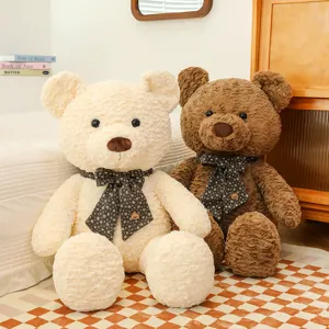 Grand peluche ours en peluche avec nœud, poupée en tissu doux pour cadeau d'anniversaire, joli décor.