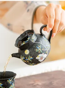 Handmade ceramic teapot featuring a rabbit and osmanthus pattern, perfect for solo tea time.