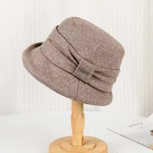 Detailed view of the vintage women's faux wool bucket hat in khaki, showcasing pleated texture.