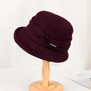 Vintage women's winter faux wool cloche hat with elegant pleated bow detail for warm daily wear.