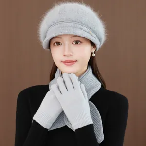 Women grey knitted beret hat scarf and gloves set winter warm cozy fashion accessory detail