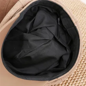 Detailed view of women's retro octagonal hat inner lining, stylish autumn fashion accessory.