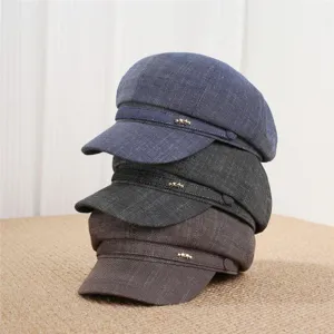 Close up of stacked denim octagonal hats featuring cute metal star decorations.