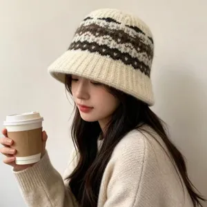 Close-up detail of the vintage patterned knit bucket hat, soft winter warm headwear.