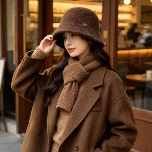 Brown knitted bucket hat detail, elegant autumn winter warm basin hat style for women.