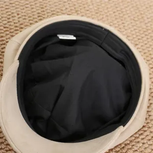 Detail view of the inner lining and quality stitching of a Japanese retro sweet cool beret hat.