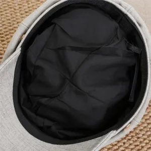 Detailed inner lining view of a stylish retro octagonal cap, showing quality craftsmanship.