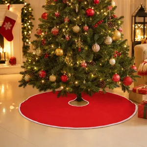 Red Christmas tree skirt detail shot with white trim, holiday home decor scene setting.