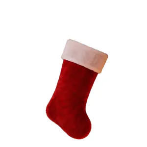 Large plush Christmas stocking with classic red and white design for holiday home decor.