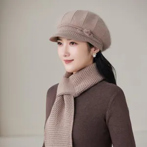 Close-up detail of women winter warm knitted beret hat and scarf set, cozy plush texture.