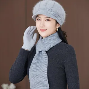 Knit beret, scarf and gloves detail shot, warm winter cozy knitted accessories set grey