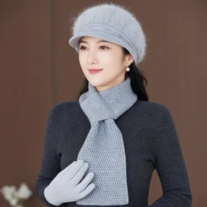 Grey knitted beret set with matching scarf and gloves, warm and cozy winter accessory for women.