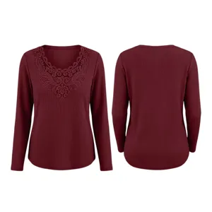 Wine red women's long sleeve waffle knit top featuring delicate lace V-neck trim detail.