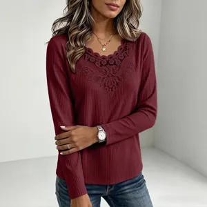 Close-up view of the elegant lace V-neck patchwork and waffle knit texture on women long sleeve top.