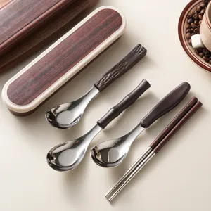Portable stainless steel spoon and chopstick set with wood grain handle tableware.