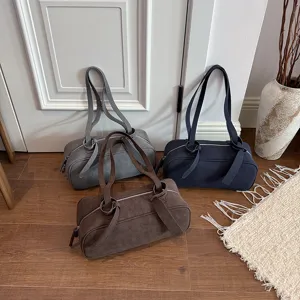 Minimalist solid color shoulder boston bag, casual vintage commuter handbag for women 2026.