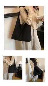 Vista dettagliata della grande borsa a tracolla hobo nera, elegante tote bag casual lifestyle.