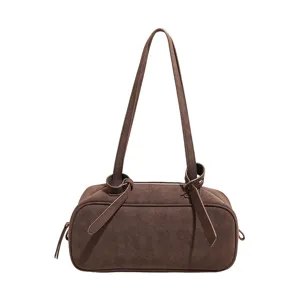 Brown minimalist shoulder bag, retro vintage Boston handbag with stylish knot strap design.