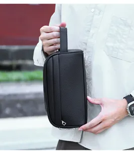 Minimalist men's black leather clutch bag, stylish commuter large capacity handbag.