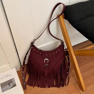 Dark red suede fringe shoulder bag for women, retro studded crossbody bag with large capacity.