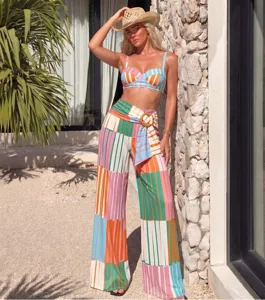 Colorful striped bikini and wide leg trousers resort beach set for women fashion.