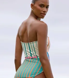 Strapless one-piece swimsuit with colorful vertical stripes, offering a chic beach look.