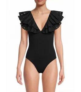 Black one-piece swimsuit with dramatic ruffle shoulders and eyelet embroidery for stylish beachwear.