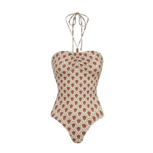 Detail view of the retro floral patterned halter swimsuit, showing the ruched bust and straps.