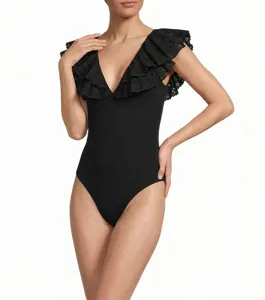 Black one-piece swimsuit featuring eyelet embroidery ruffles, V-neck and high-cut style.