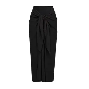 Black knot-front detail of the midi skirt, showcasing the elegant draping and texture closely.