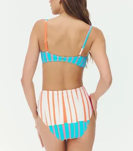 Back view detail of colorful striped swimsuit, beach vacation wear showing back straps.