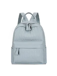 Light blue quilted leather backpack for women, stylish casual large capacity daily school bookbag.