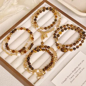 Braccialetto a Doppio Giro in Pietra Occhio di Tigre Vintage per Donna Stile Maillard Fatto a Mano Perla d'Acqua Dolce Cristallo Bracciale con Pendente a Fiocco Pianeta