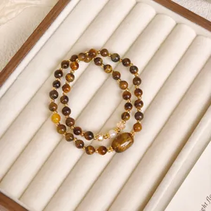 Bracciale doppio di perline in occhio di tigre retrò cinese con perle dorate e perla elegante.