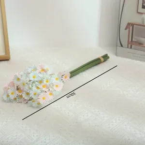 Close up detail of artificial pink and white daisy flower bouquet for home decor 50cm