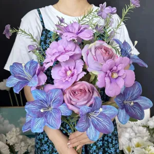 Detailed view of artificial purple rose and blue lily bouquet for DIY crafts and accessories.