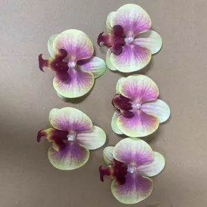 Large artificial phalaenopsis orchid flower heads for wedding decoration and DIY crafts.