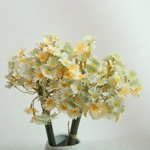 Artificial daisy flower bouquet detail view, elegant home decoration for living room table.