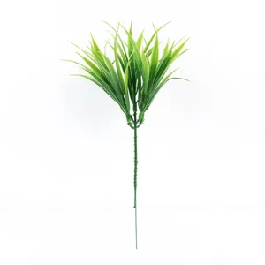 Detailed close-up view of artificial plastic grass stem, realistic green plant decor.