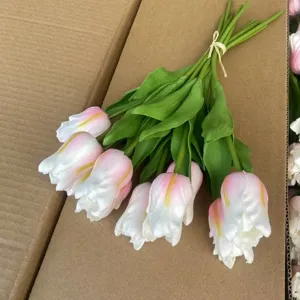 Detail shot of artificial PU tulip flower bundle, pink and white gradient lace design.