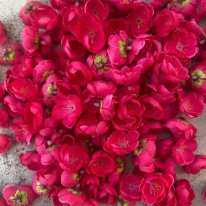 Artificial red plum blossom flower heads for DIY crafts, hair accessories, and party decor.