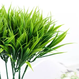 Artificial plastic grass 7-fork fake plant green foliage decor for indoor home decor.