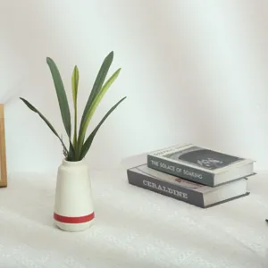Artificial sword orchid leaves for home decor, detailed floral arrangement piece.