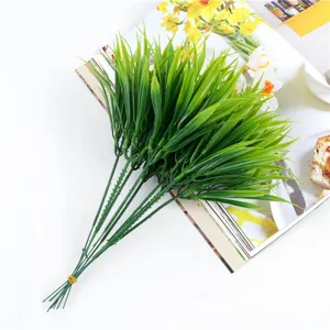Artificial plastic green grass bouquet detail, 7-forked fake plant for indoor home decor.