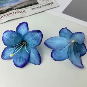 Artificial 3D printed silk lily flower heads for DIY crafts, hair clips, and clothing accessories detail.