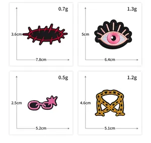 Geborduurde patches set met creatieve oog- en kettingontwerpen en exacte afmetingen.