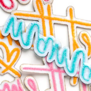 Glitter cursive letter embroidered patch iron-on badge DIY clothing apparel accessory.
