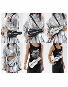 Y2K guitar shaped crossbody shoulder bag with metal rivets, black and white aesthetic detail.